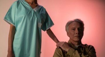 A compassionate adult-gerontology primary care nurse practitioner consulting with an elderly patient in a clinic, emphasizing the importance of preventive and holistic healthcare for aging adults.