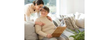 Illustration of seniors engaging in group activities, nature walks, and wellness programs in an assisted living community designed for holistic wellbeing